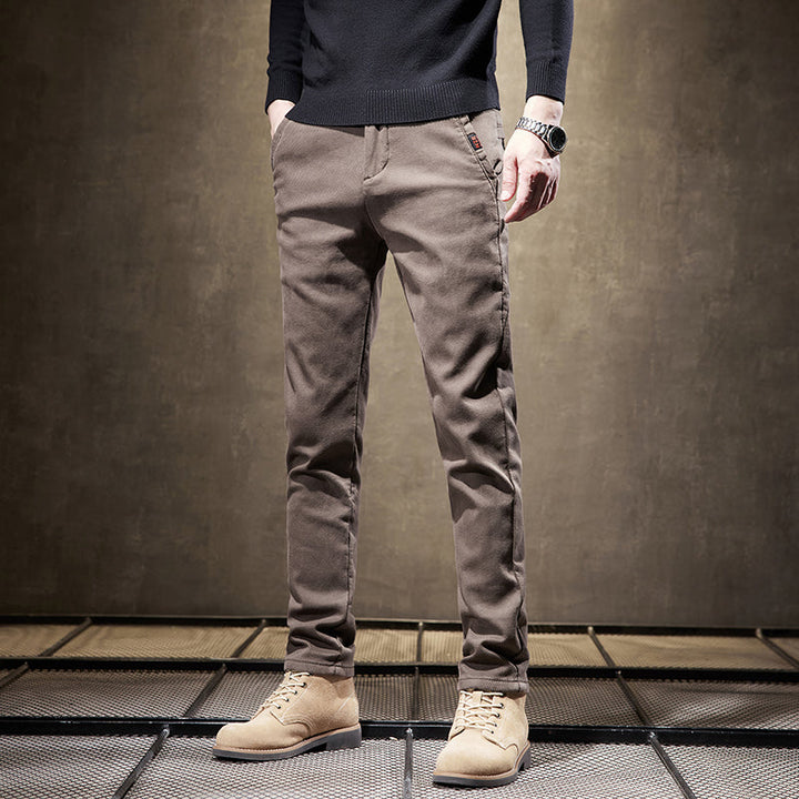 Close-up of fabric: Wrinkle-resistant men's slim fit pants, offering stretch comfort for everyday wear.
