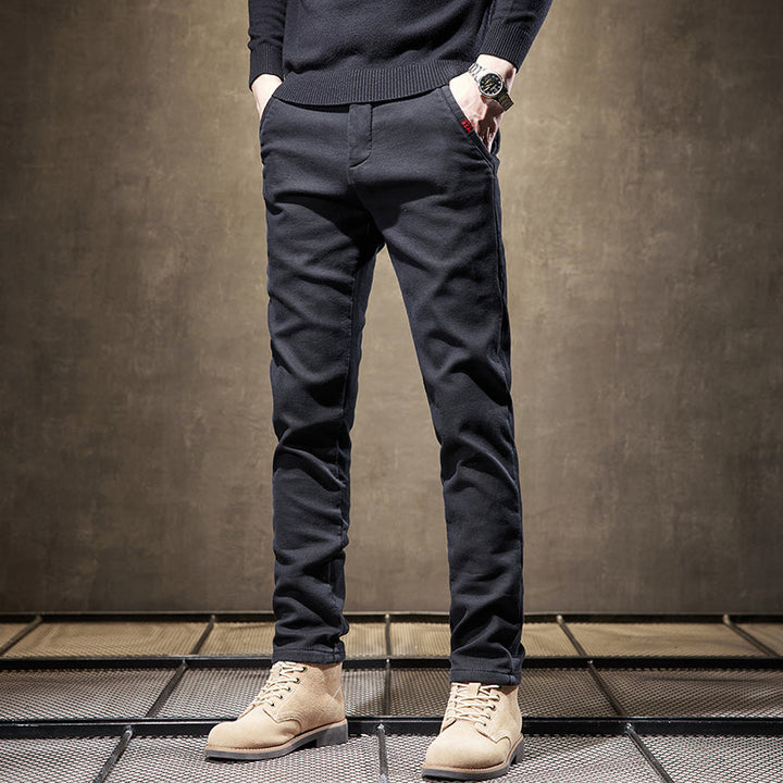 Detail shot of a man wearing comfortable, stretch, wrinkle-resistant slim fit pants for smart casual style.