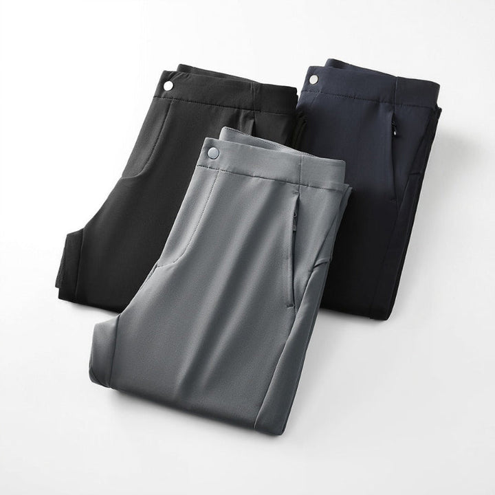 Modern slim fit men's pants, available in gray or black, offering a sculpted, clear style.