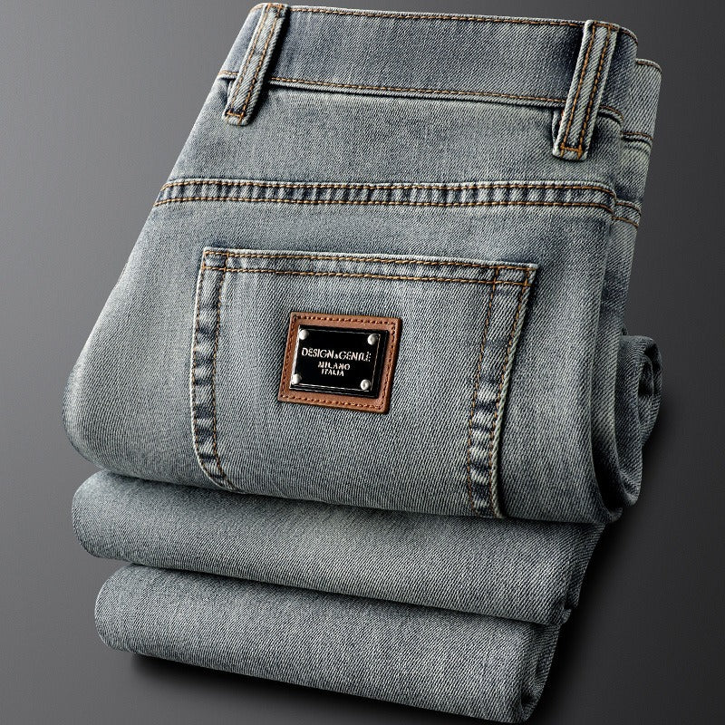 Comfortable men's slim fit gray stretch denim jeans for a stylish, modern casual aesthetic.