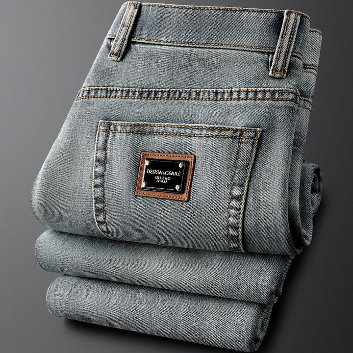 Comfortable men's slim fit gray stretch denim jeans for a stylish, modern casual aesthetic.