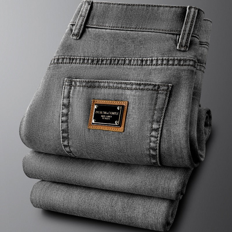 Stylish men's gray stretch denim jeans in a slim fit, versatile casual pants for everyday wear.