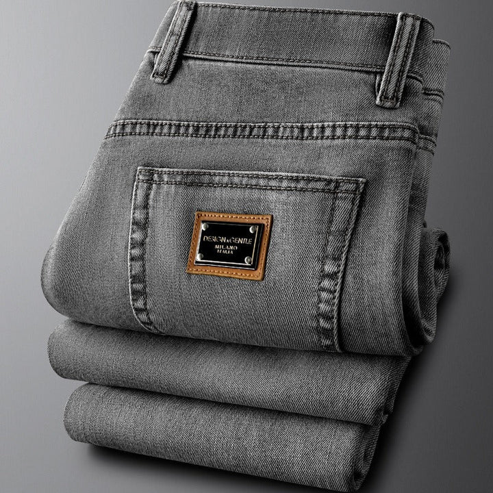 Stylish men's gray stretch denim jeans in a slim fit, versatile casual pants for everyday wear.