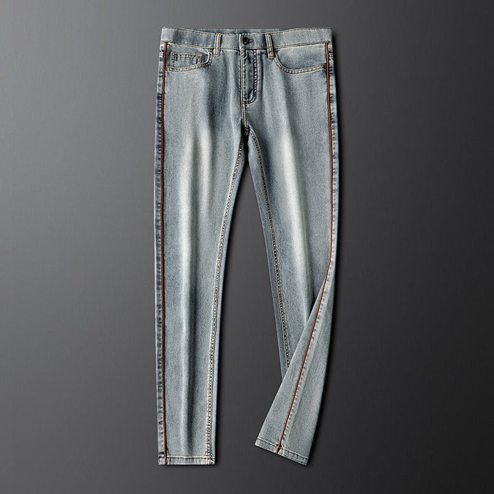 Modern men's slim fit gray stretch denim jeans, ideal for comfortable and stylish casual wear.