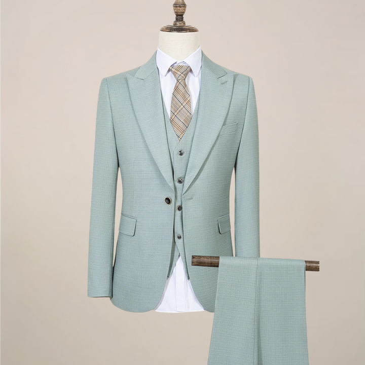 Men's slim fit green three-piece suit, ideal for summer formal events.