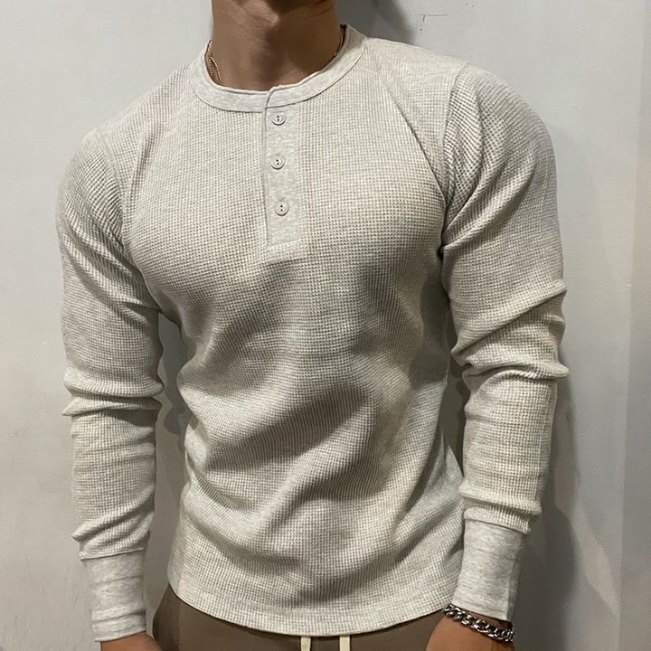 Durable men's athletic henley muscle shirt with a slim fit, great for active lifestyles.