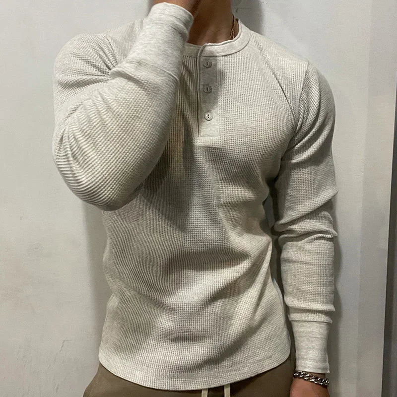 Men's fashion henley muscle shirt, designed for a sleek slim fit & everyday style.
