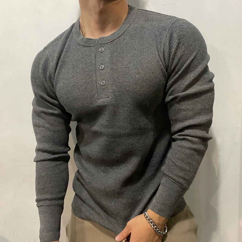 Stylish men's henley muscle shirt for athletic & casual fashion, a must-have layering top.