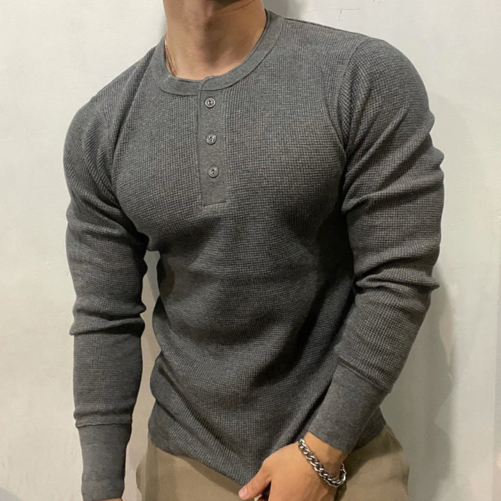 Stylish men's henley muscle shirt for athletic & casual fashion, a must-have layering top.