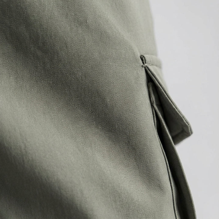 Sportswear men's slim fit jogger trousers, side view showcasing tapered leg and comfortable fit