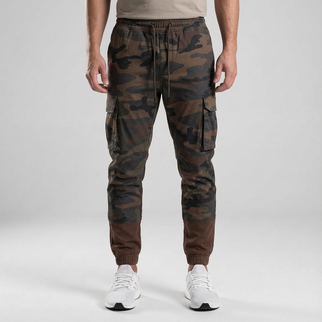 Detailed shot of tapered leg on men's slim fit jogger trousers, a key streetwear feature