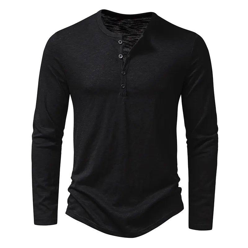 Man enjoying outdoor activities wearing a blue slim fit Henley, ideal for versatile casual wear.