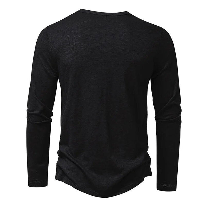 Side profile of a model wearing a comfortable slim fit Henley, showing its flattering cut.