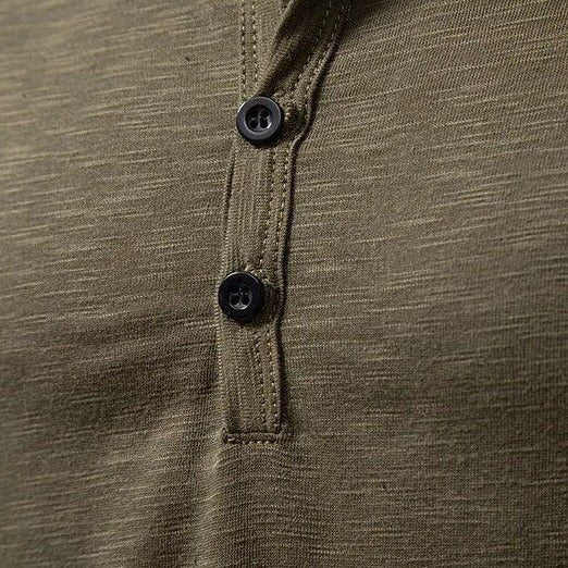 Folded men's long sleeve Henley shirt, emphasizing its soft fabric and versatile basic style.
