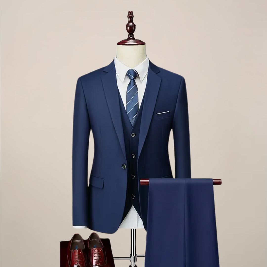Men's slim fit navy three-piece suit, perfect for weddings & formal events. Tailored dark blue men's fashion.