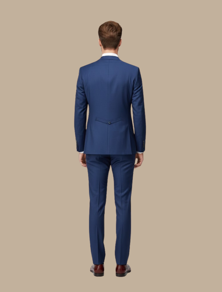 Stylish dark blue men's slim fit three-piece suit. Essential formal wear for evening events & special occasions.