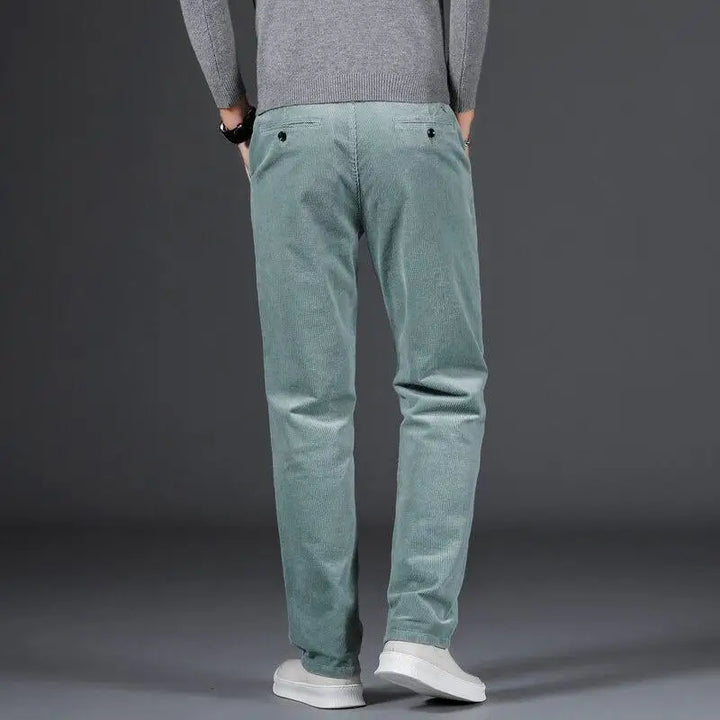 Versatile slim fit men's casual pants, also suitable as modern work pants or formal attire.