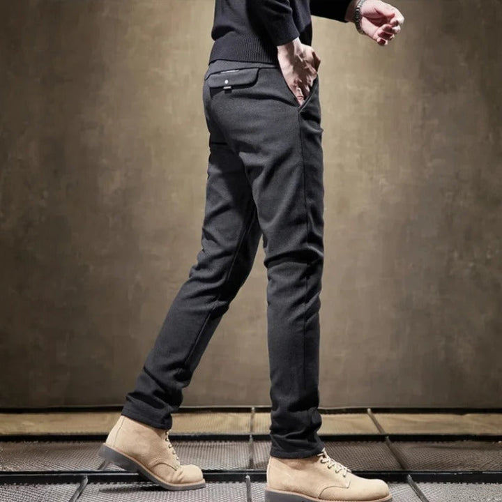 Modern men's stretch slim fit pants, offering a tailored look & performance comfort.