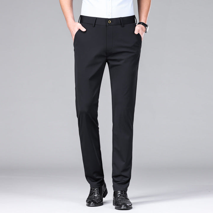 Stylish men's slim fit performance trousers, offering a sleek silhouette and practical features.