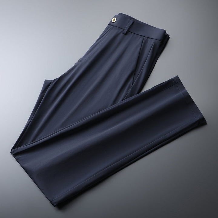 Men's performance apparel: Slim fit trousers with excellent stretch and moisture-wicking.
