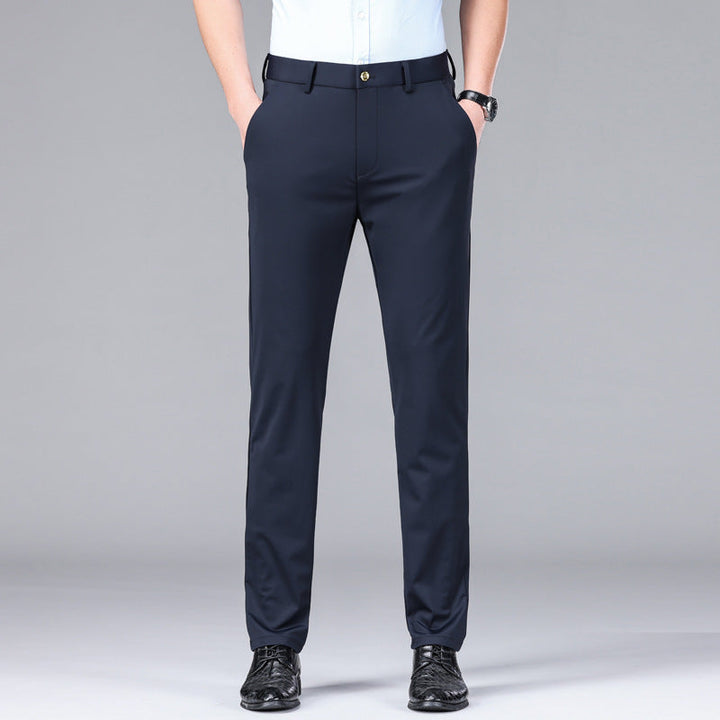 Men's apparel: Slim fit trousers with moisture control, stretch, and a smart, modern design.