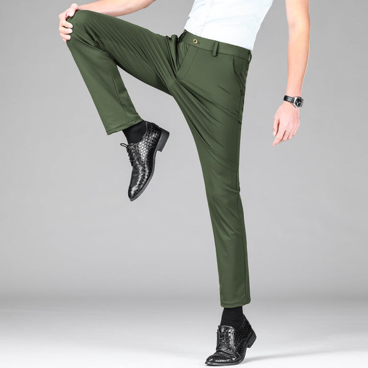 Smart men's trousers, slim fit, offering a blend of casual style and performance features.