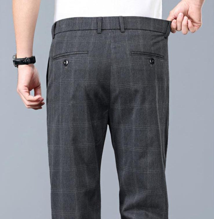 Elevate your wardrobe with these stylish men's slim fit plaid dress pants.