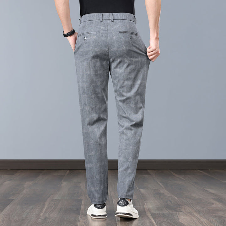 Modern slim fit plaid pants offering comfort and style for any occasion.