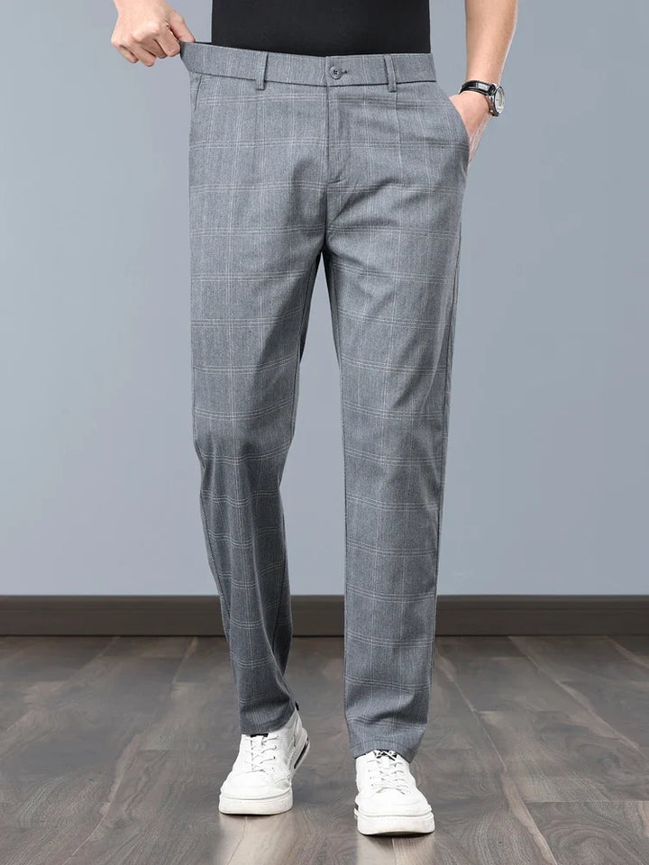 Sophisticated men's plaid pants with a slim fit design for sleek appeal.