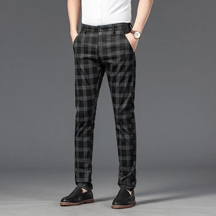 Men's slim fit plaid dress trousers, combining comfort and style for a modern look.