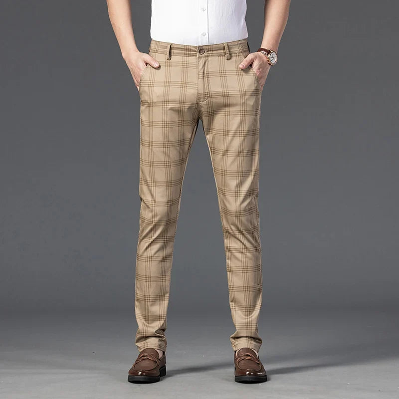 Tailored men's business casual plaid trousers, perfect for a smart and comfortable professional outfit.