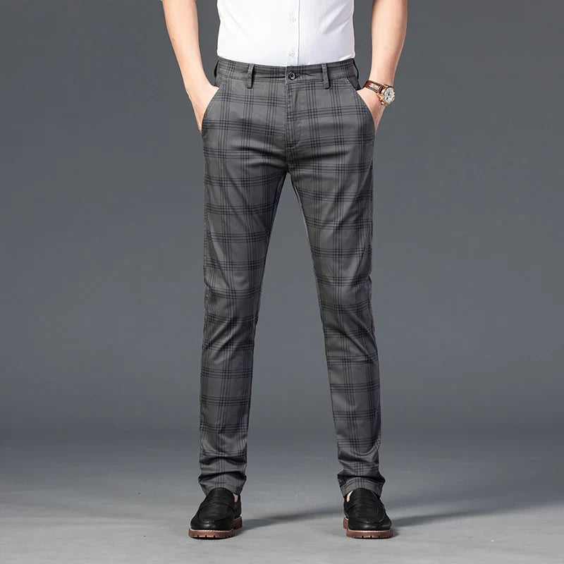 Elegant men's slim fit plaid dress pants, ideal for fashion-forward wardrobes, offering a sharp silhouette.