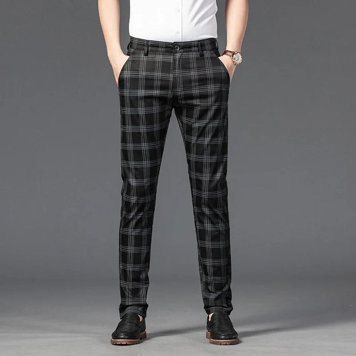 Comfortable men's plaid dress trousers, designed with a slim fit for a contemporary and sophisticated appeal.
