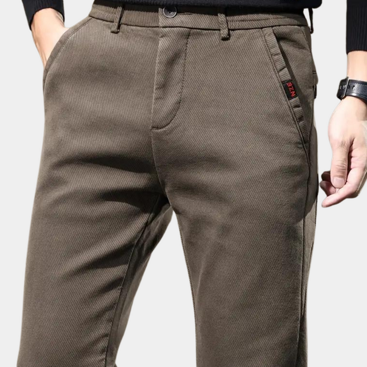 Close-up of Men's Slim Fit Semi-Formal Trousers texture. High-quality fabric for durable, stylish office wear.