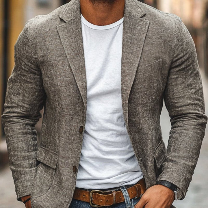 Modern men's slim fit single-breasted blazer for sleek fashion, suitable for various occasions.