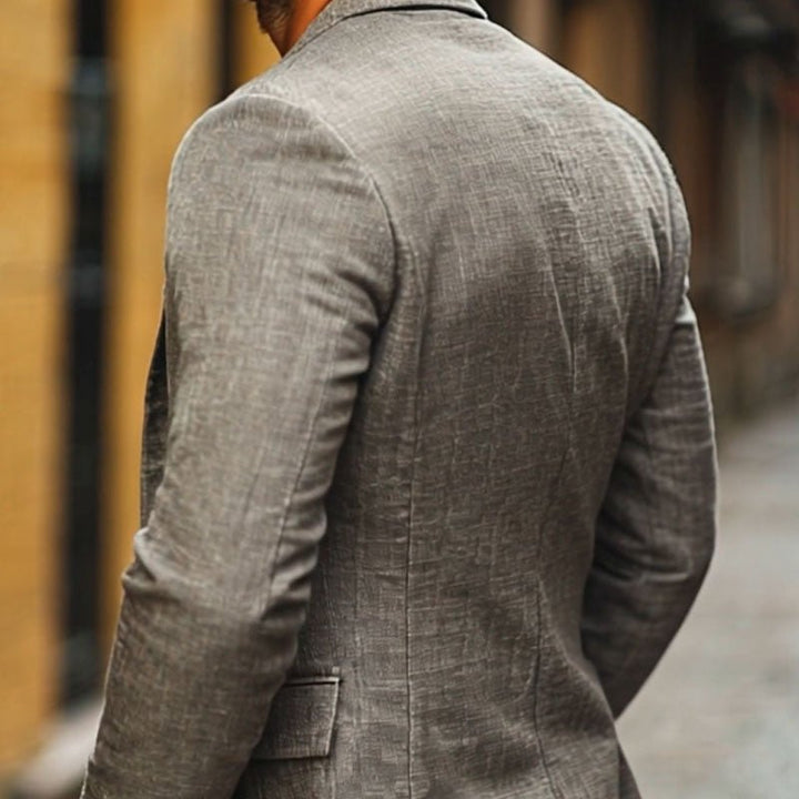 Elegant men's slim fit single-breasted blazer jacket, perfect for stylish event wear.