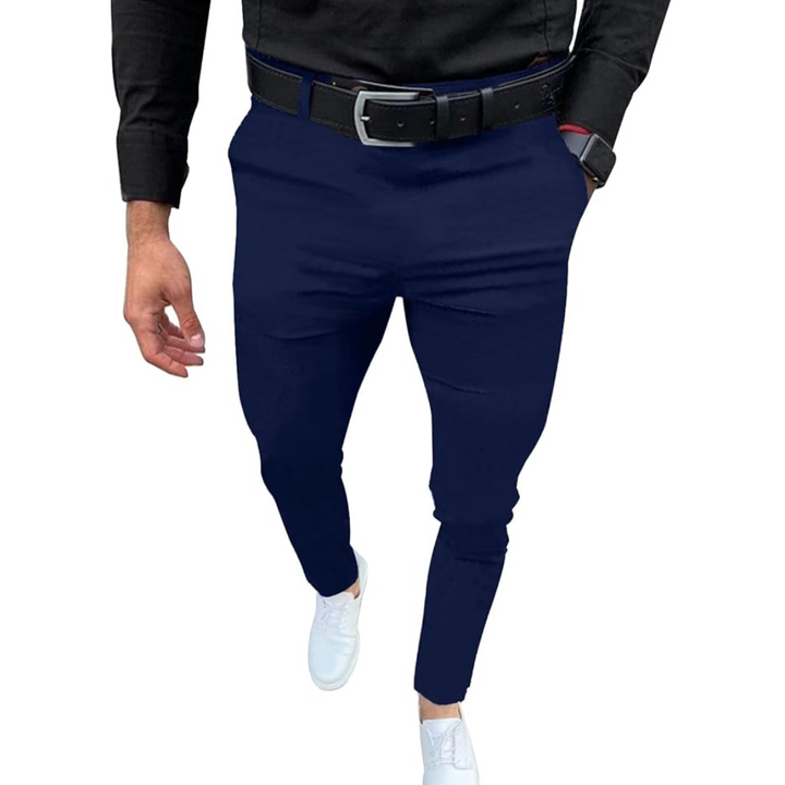 Man wearing slim fit stretch trousers, demonstrating flexibility and style