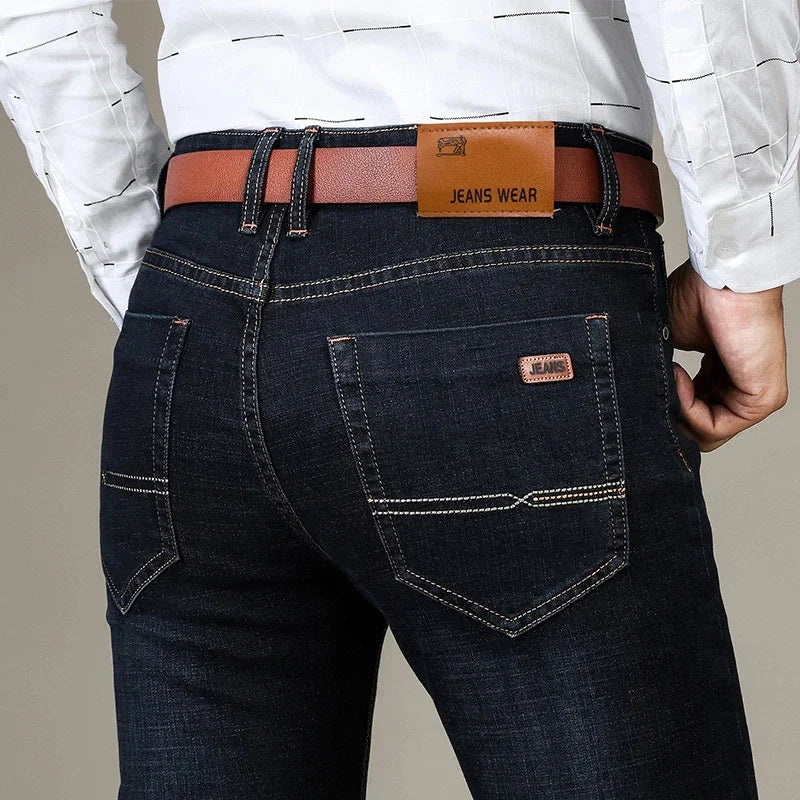 Blue men's slim fit stretch jeans, perfect for casual or smart workwear.