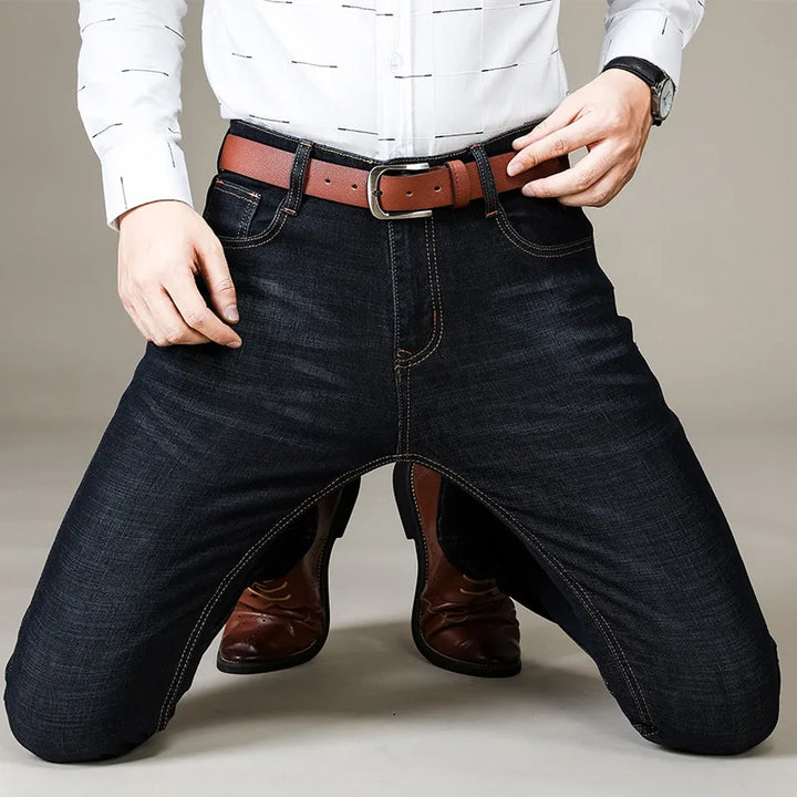Black slim fit stretch jeans for men, versatile and comfortable everyday fashion.