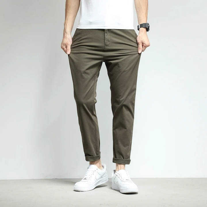 Comfortable men's slim-fit tech pants with stretch for flexibility. Great for active lifestyles.
