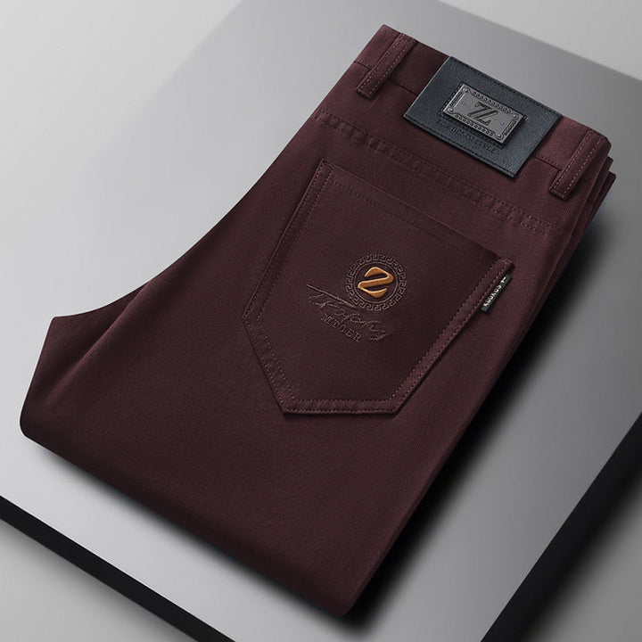 Black men's slim fit stretch dress trousers, ideal for formal occasions or smart casual office wear. Comfortable.