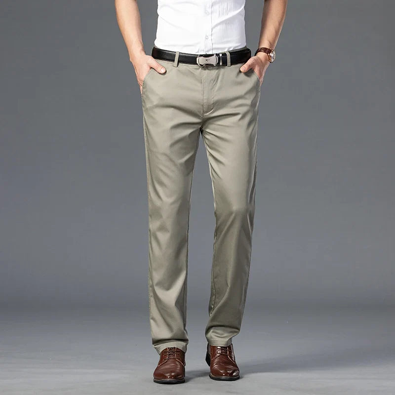 Men's slim fit dress trousers with stretch fabric, perfect for professional settings or elegant casual outfits.