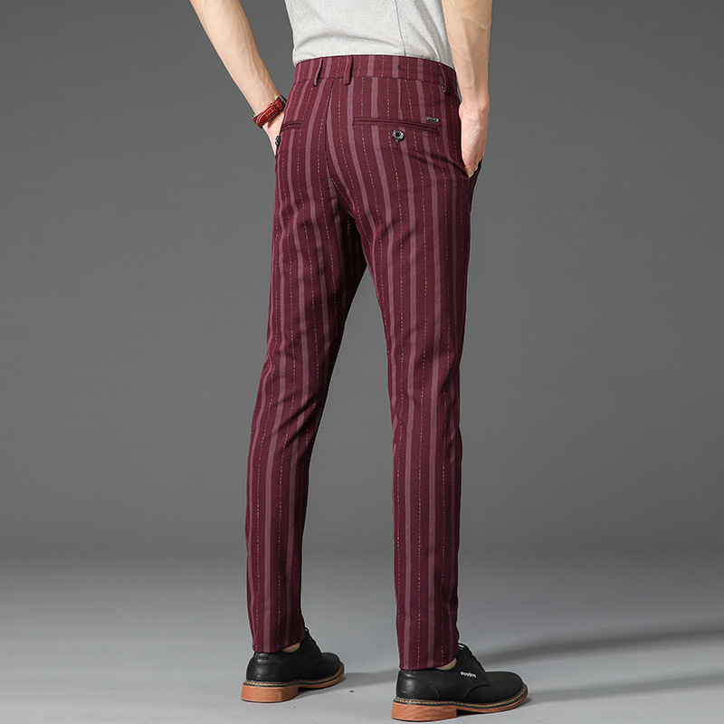 Comfortable men's slim fit striped dress pants, offering a stylish look for formal and office settings.