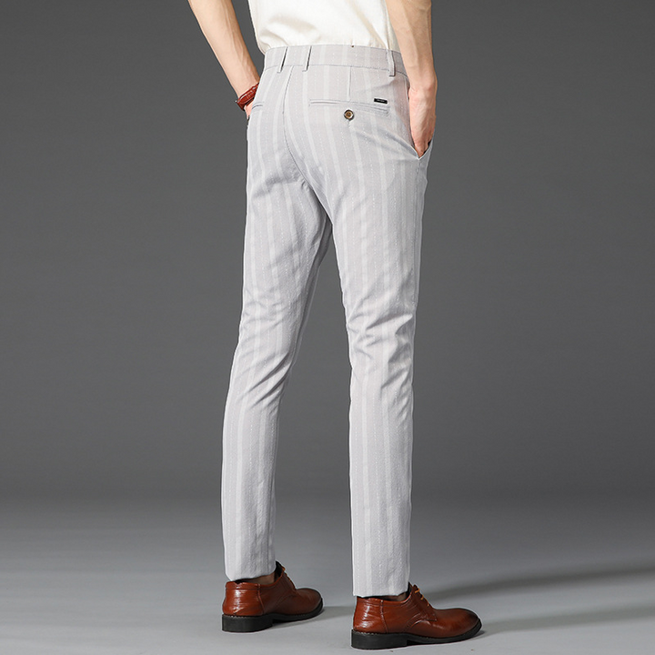 Formal men's slim fit striped trousers for a sharp, professional office look.