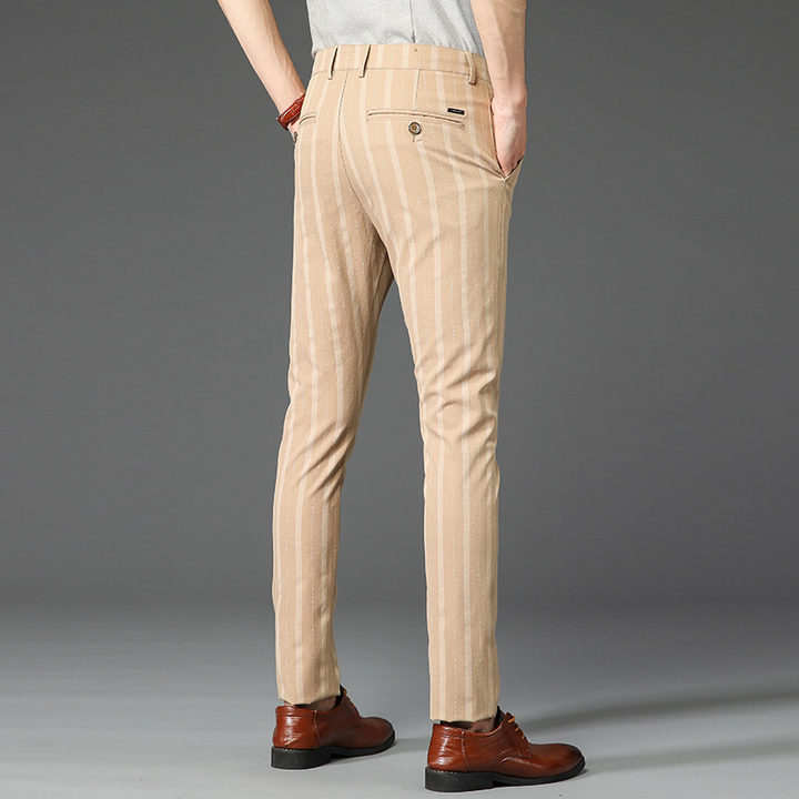 Elegant men's pinstripe slim fit trousers, versatile for formal or smart casual outfits.
