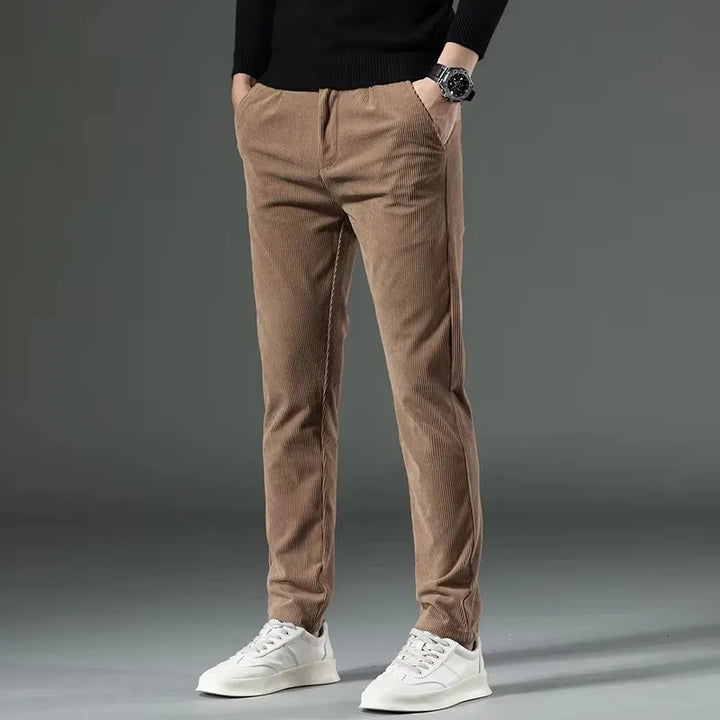 Khaki men's stretch tailored pants, slim fit for comfort, modern style & wrinkle resistance.