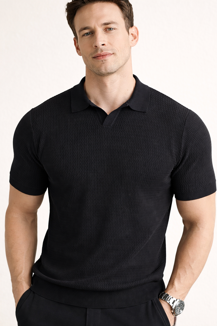 Close-up of modern men's slim fit textured polo shirt fabric, highlighting comfortable & stylish detail.