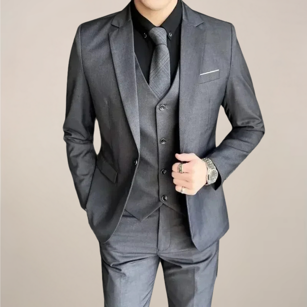 Men's slim fit three-piece suit for business events, weddings, and formal occasions. Tailored professional attire.