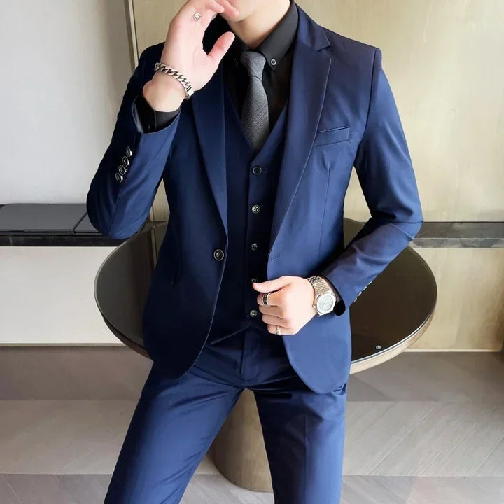 Elegant men's tailored slim fit 3-piece suit. Perfect professional business wear or sophisticated party attire.
