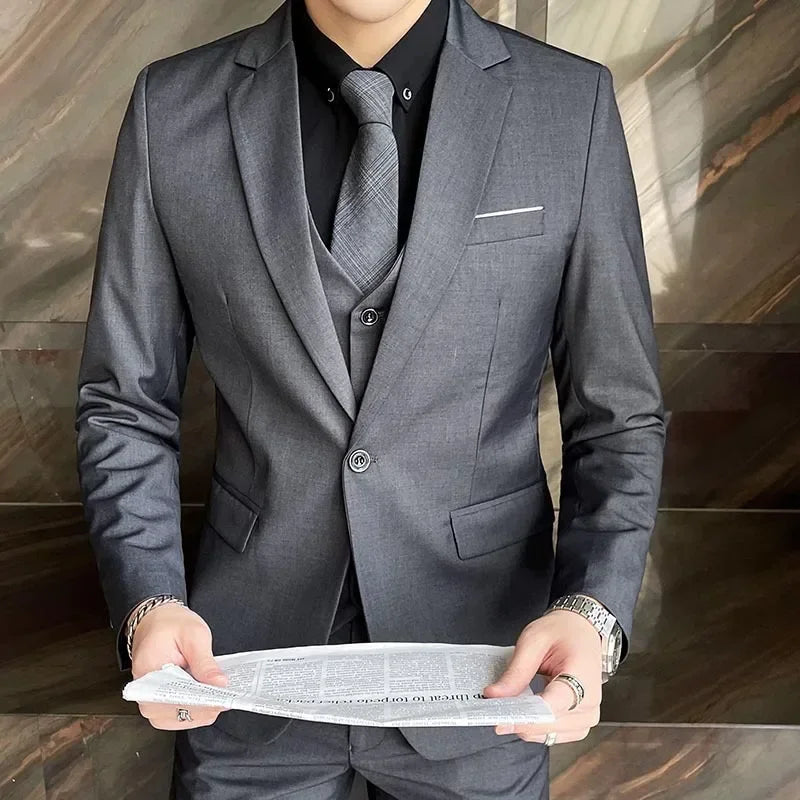 Sharp men's three-piece slim fit suit set including jacket, vest & trousers for a modern, professional look.